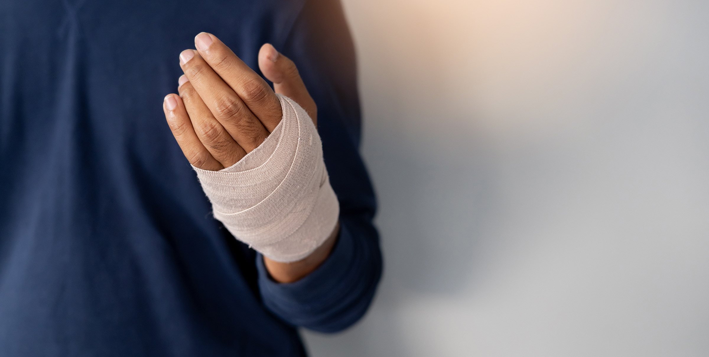 Bandage covering injured hand